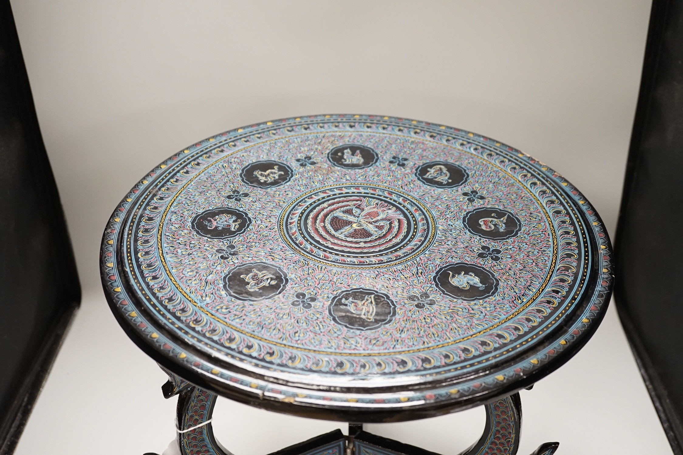 A Burmese lacquered dish and stand, 38cm tall